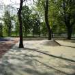 Budapest, XI. kerület, Bikás park, járda vízáteresztő burkolata - kavicsburkolat, térburkolat, műgyantaburkolat, kőburkolat referencia